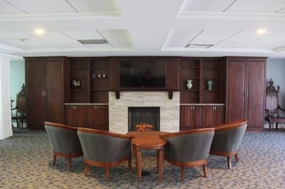 Interior lounge area with seating and fireplace