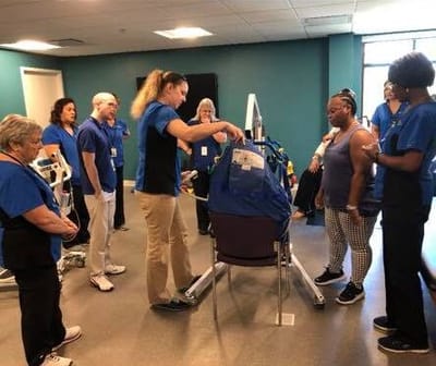 Staff training session in a facility common area