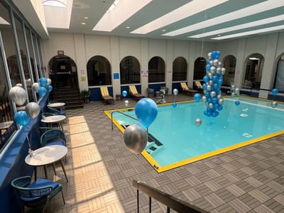 Indoor swimming pool area decorated for an event
