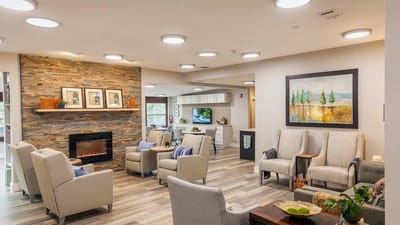 Bright common area with seating and artwork