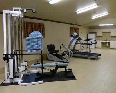 Interior view of a fitness area with exercise equipment