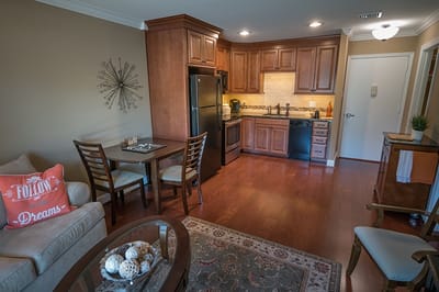 Cozy interior of a senior living unit with a kitchen