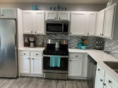 Bright kitchen area with modern appliances