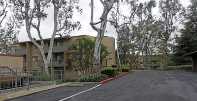 Exterior view of residential buildings with trees