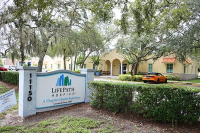 Exterior of a senior living facility with landscaping