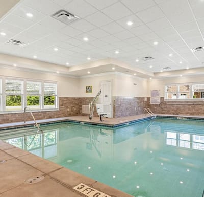 Indoor swimming pool area at a senior living facility