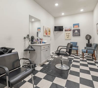 Interior of a hair salon with styling chairs and decor