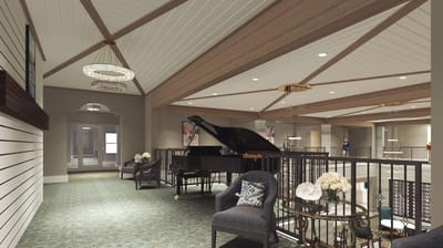 Bright common area with a grand piano and seating