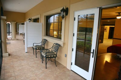 Interior hallway with seating area and windows
