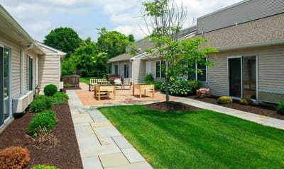 A beautiful outdoor courtyard with seating and greenery