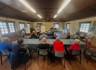 Residents participating in an activity session in a common area