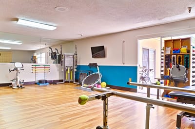 Interior view of an exercise area with equipment
