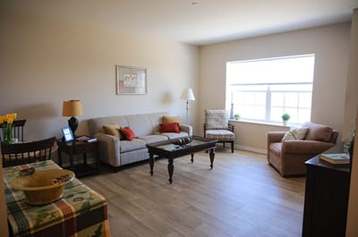 Cozy common area with seating and natural light
