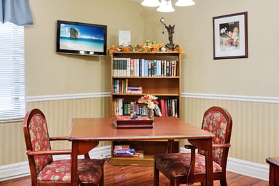 Cozy interior corner with bookshelves and seating