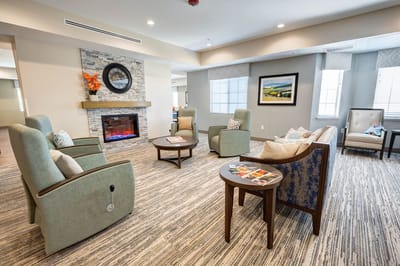 Common area with cozy seating and a fireplace