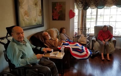 Residents relaxing in a cozy common area