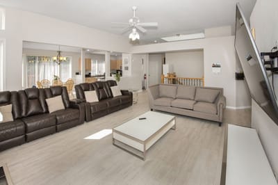 Bright common area with comfortable seating and open space