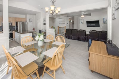 Bright and welcoming common area with dining table