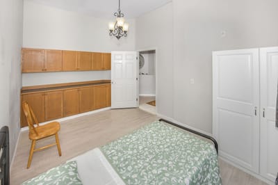 Bright, well-furnished private resident room.