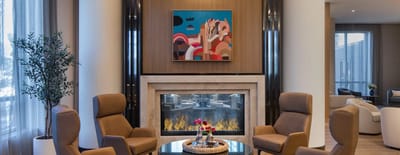 Interior of a cozy common area with a fireplace