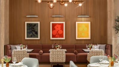 Elegant dining room with modern decor and artwork