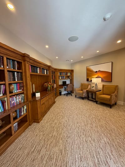 Interior of a cozy common area with bookshelves
