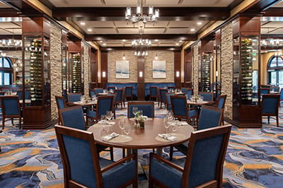 Elegant dining room setup with tables and chairs