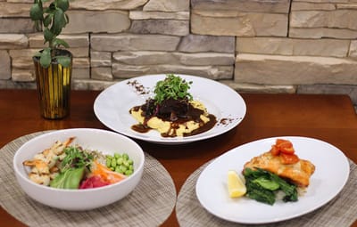 Gourmet meal service featuring multiple plated dishes