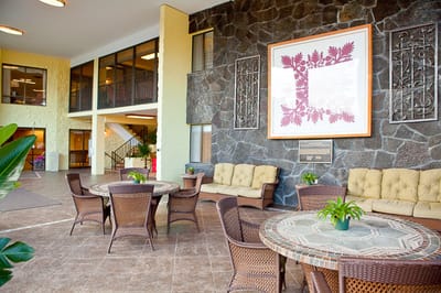 Bright common area with seating and artwork