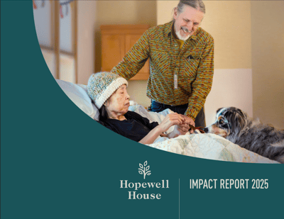 A staff member interacting with a resident in a cozy room