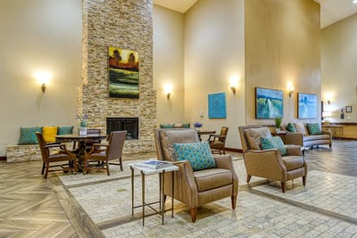 Bright common area with seating and art decor