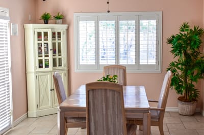 Bright interior common area with dining table