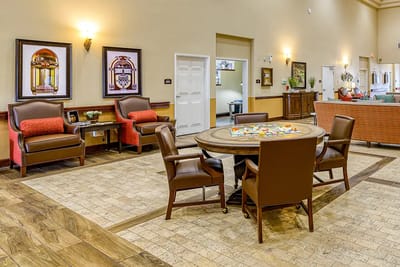 Interior common area with seating and activity table