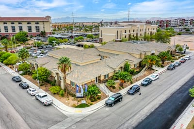 Aerial view of the assisted living facility's exterior with landscaping