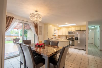 Bright interior of a dining area with a view of the patio