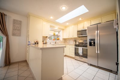 Bright, modern kitchen with stainless steel appliances