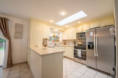 Bright kitchen with modern appliances and natural light