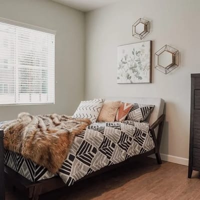 A cozy bedroom setup with modern decor