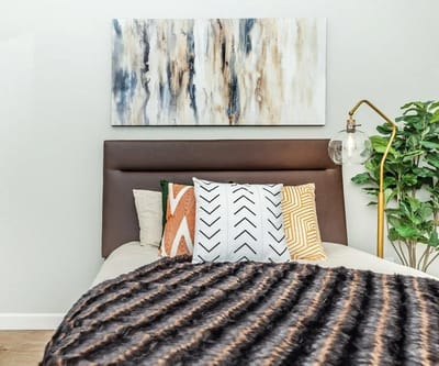 Cozy bedroom setup with decorative pillows