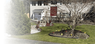Exterior view of a well-maintained senior living facility with landscaping