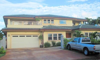 Exterior view of a senior living facility with landscaping
