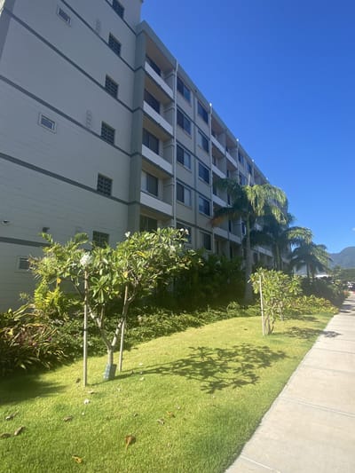 Exterior view of the building with landscaped gardens