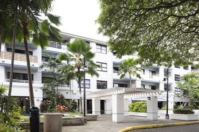 Exterior view of Lani Huli Elderly Apartments surrounded by greenery