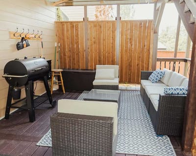 Cozy outdoor seating area with grill