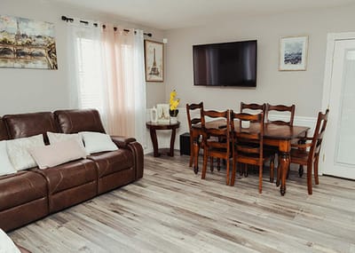 Cozy common area with a dining table and seating