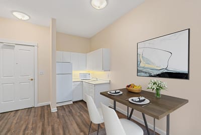 Clean and modern kitchen area in a resident suite