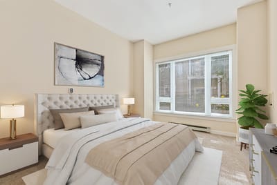 Bright, inviting bedroom in a senior living facility
