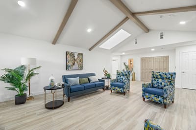 Bright common area with comfortable seating and decor
