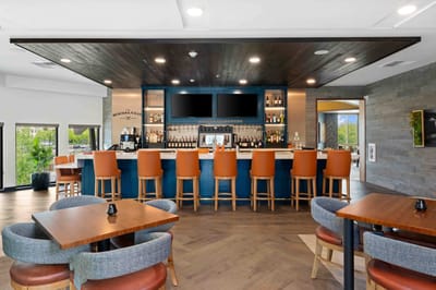 Stylish lounge bar area with seating and drinks
