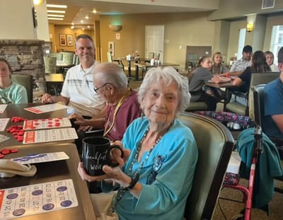 Residents enjoying a game in a common area